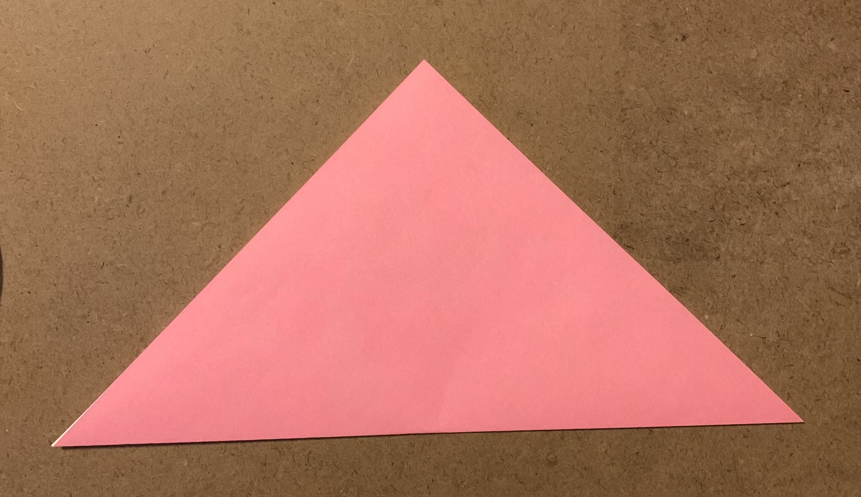origami paper folded into a triangle