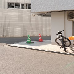 green and orange traffic cones